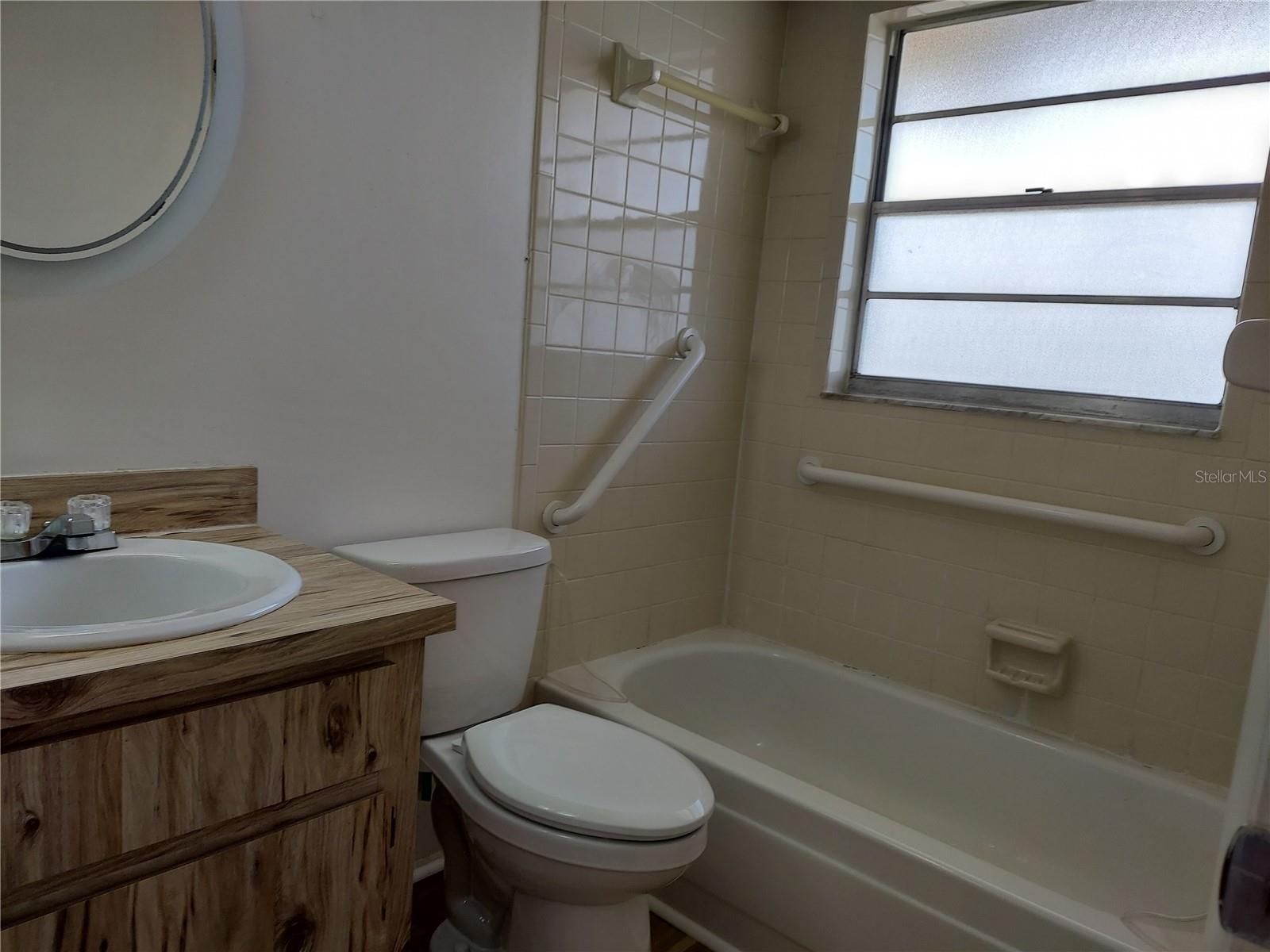Tub/shower and the new toilet