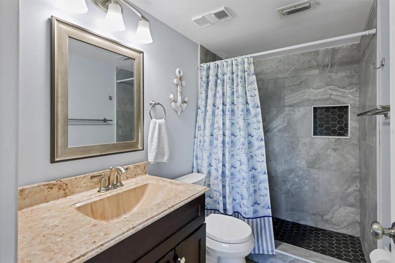 Master Bathroom with a beautiful  tiled shower!