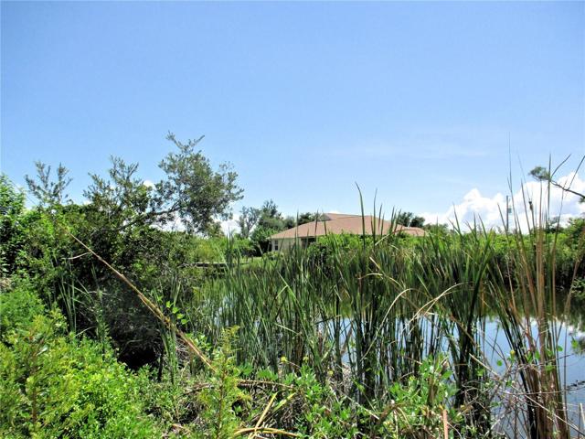 Canal to left of lot