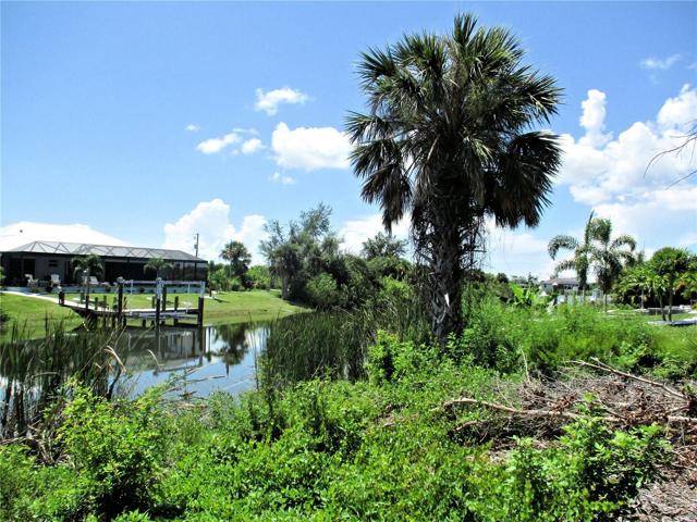Canal to right of house