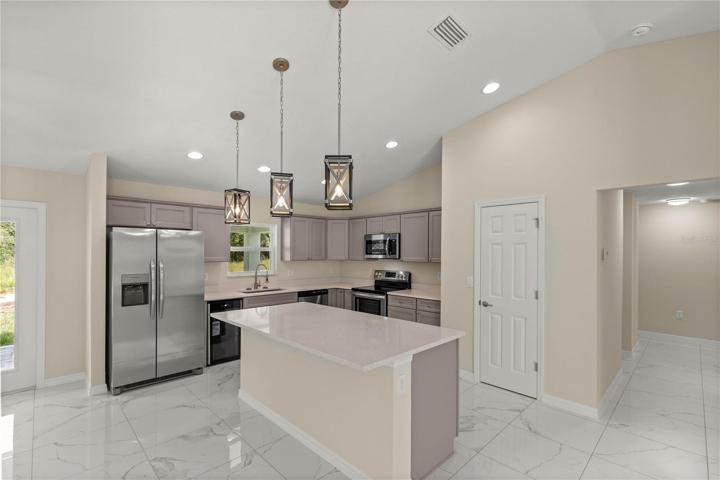STAINLESS STEEL APPLIANCES AND WINE REFRIGERATOR