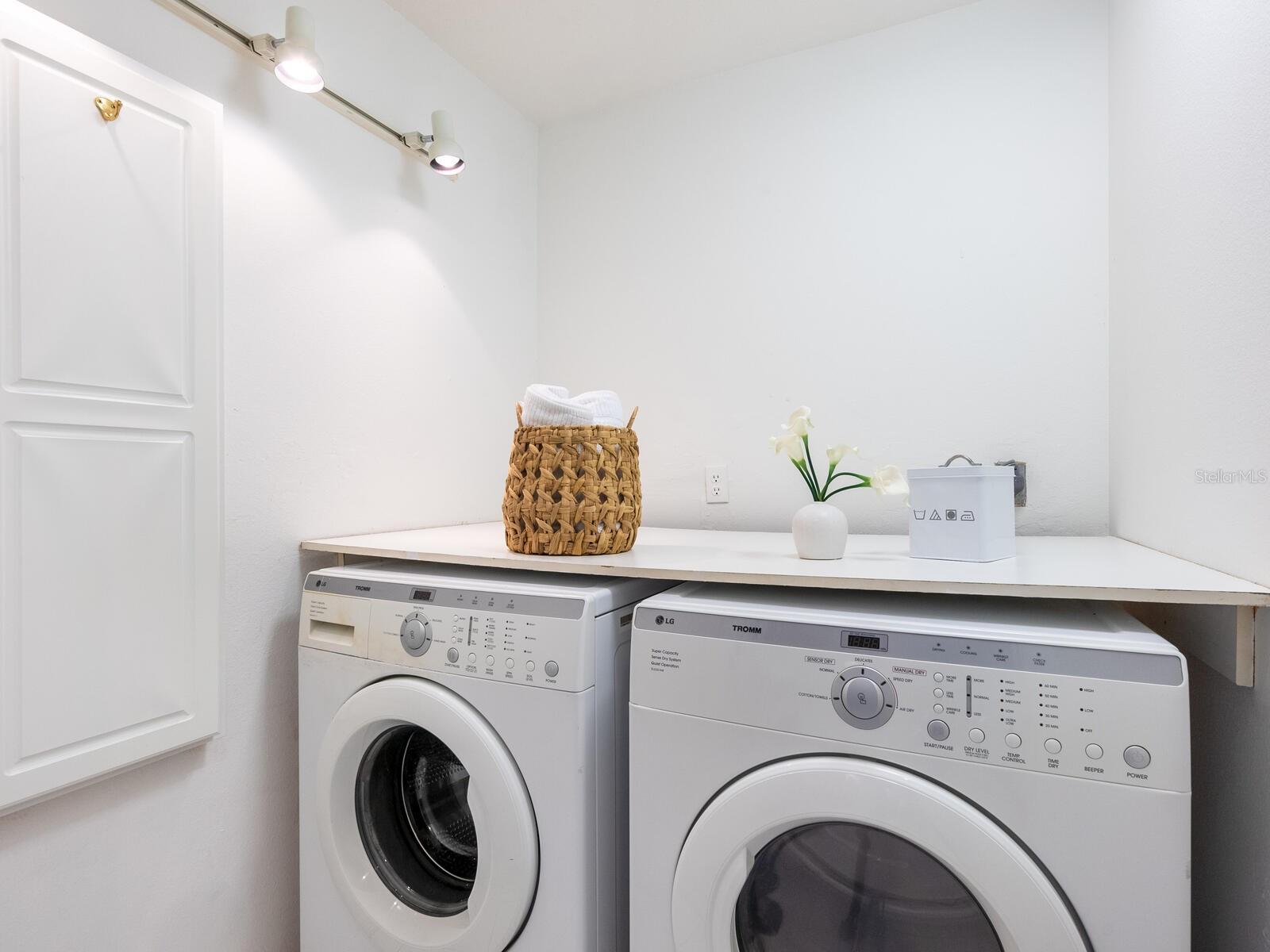 interior laundry with pull down ironing board