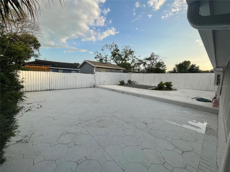 Patio and former pool deck