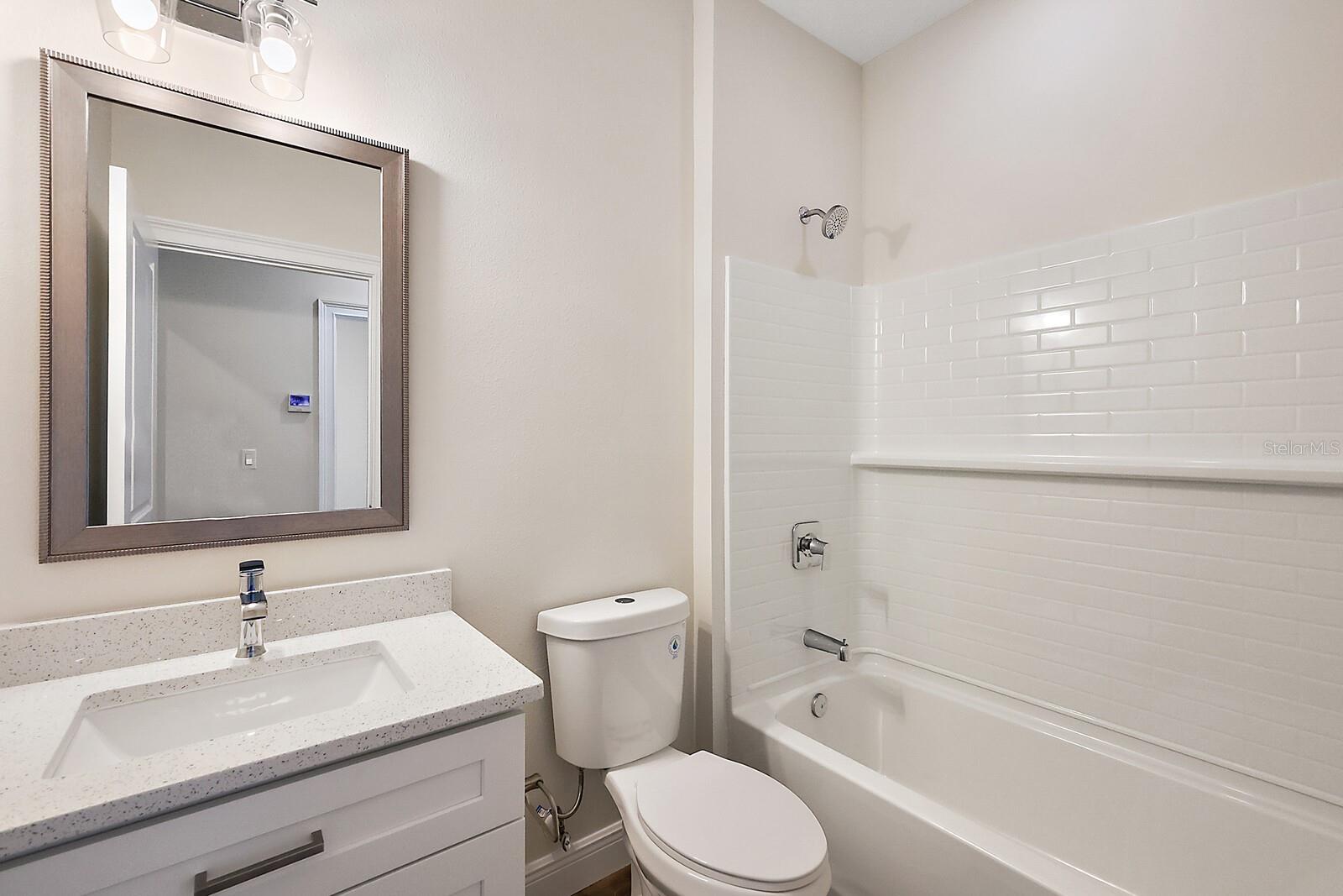 One of 2 guest bath