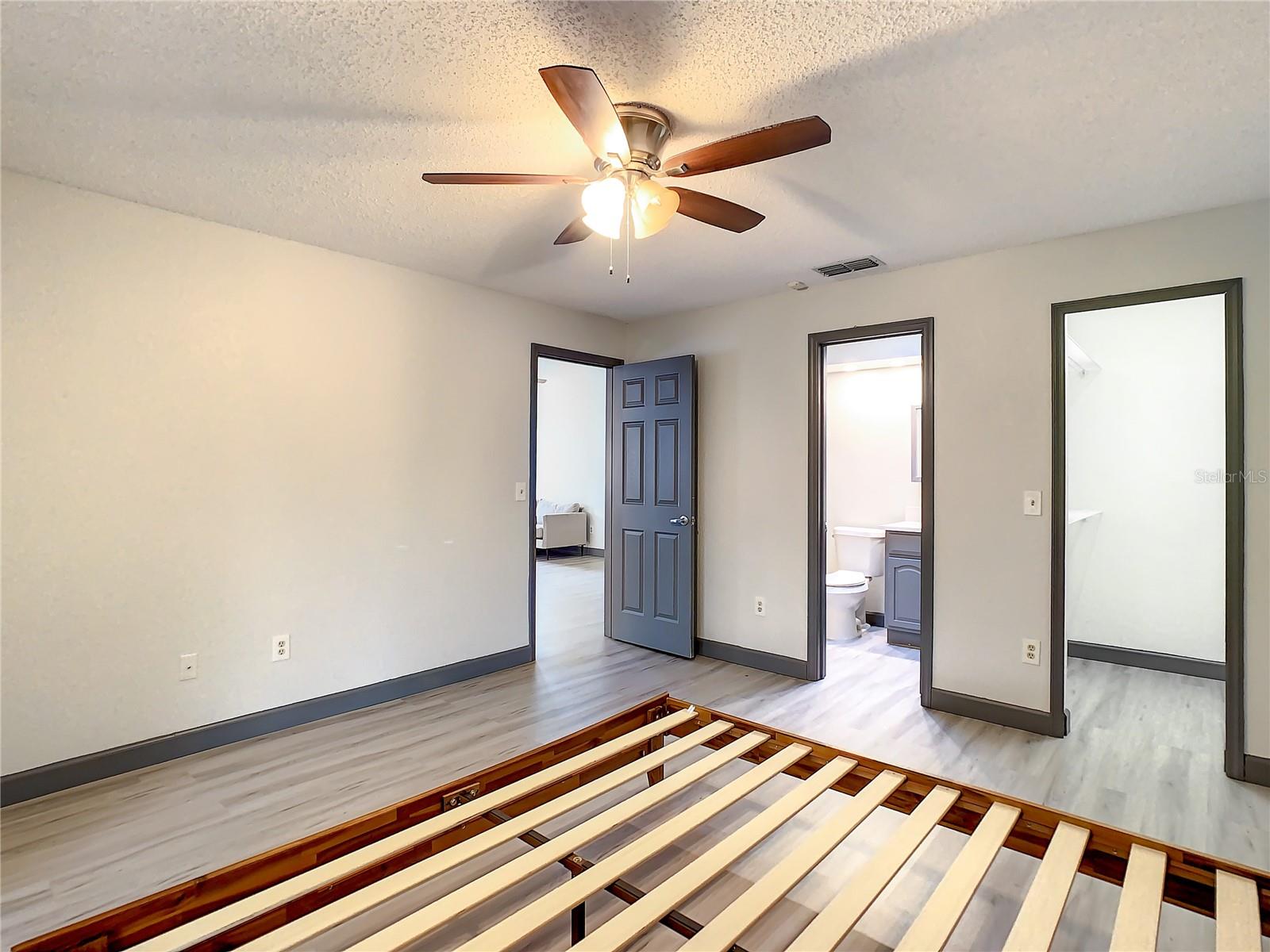 MASTER BEDROOM ENTRY DOOR, BATHROOM & WALK-IN CLOSET