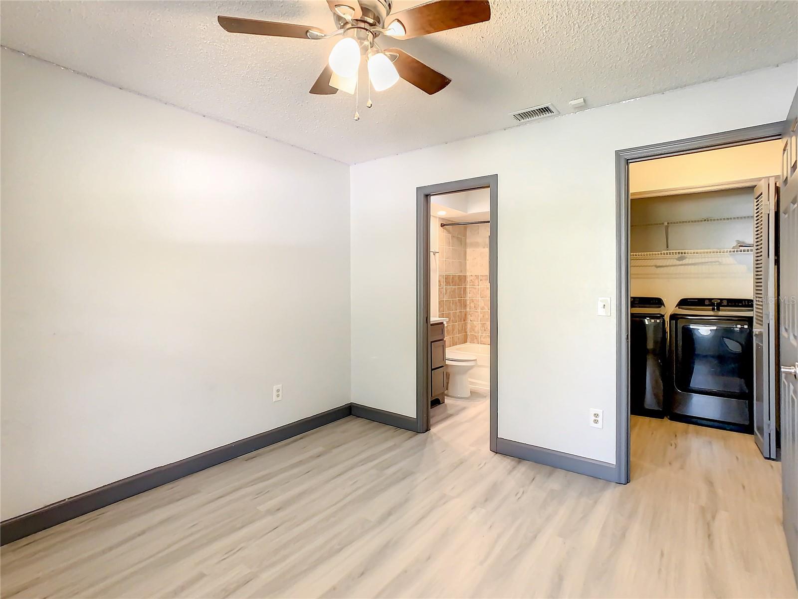 2ND BEDROOM LAUNDRY AREA VIEW & BATHROOM PRIVATE ENTRY WAY