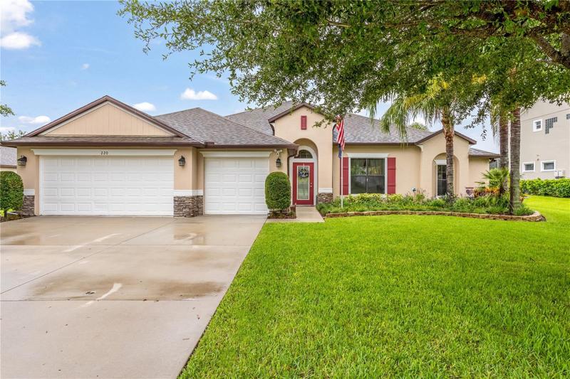 Beautiful Landscaping with mature Oak Tree on front lawn