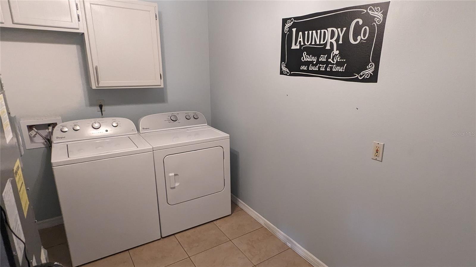 Full-Sized Laundry Room with Extra room for Storage!