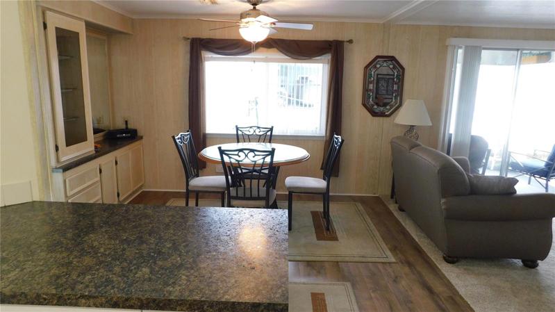 Dining area is open with kitchen and living room.