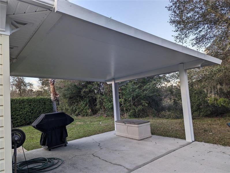 Solid surface pergola for extended outdoor living