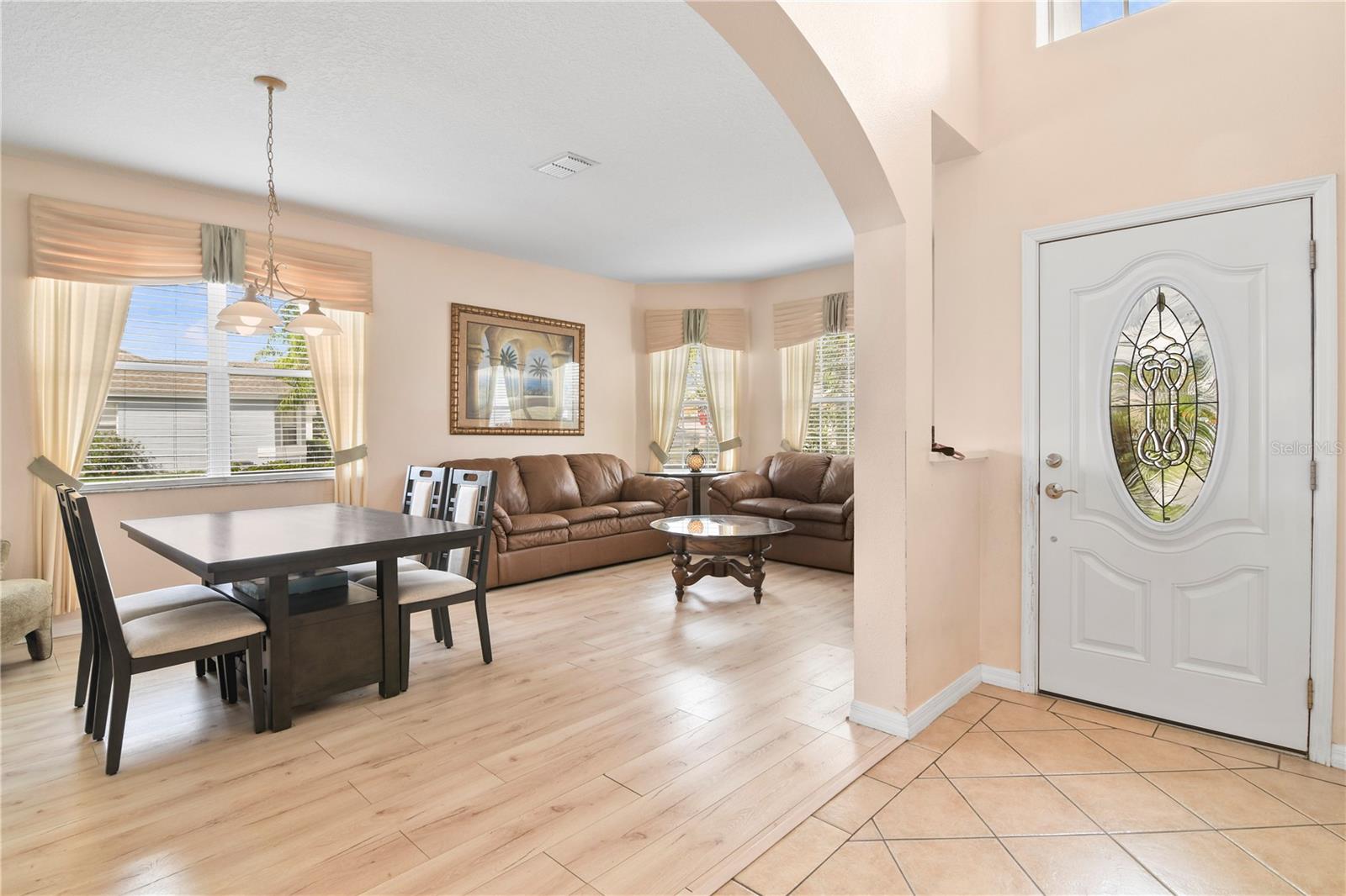 Your foyer opens up to formal (or flex!) living and dining spaces with easy access to the family room and kitchen!