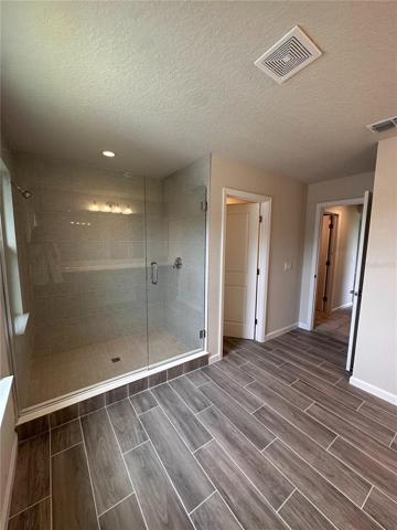 Spacious primary suite bathroom