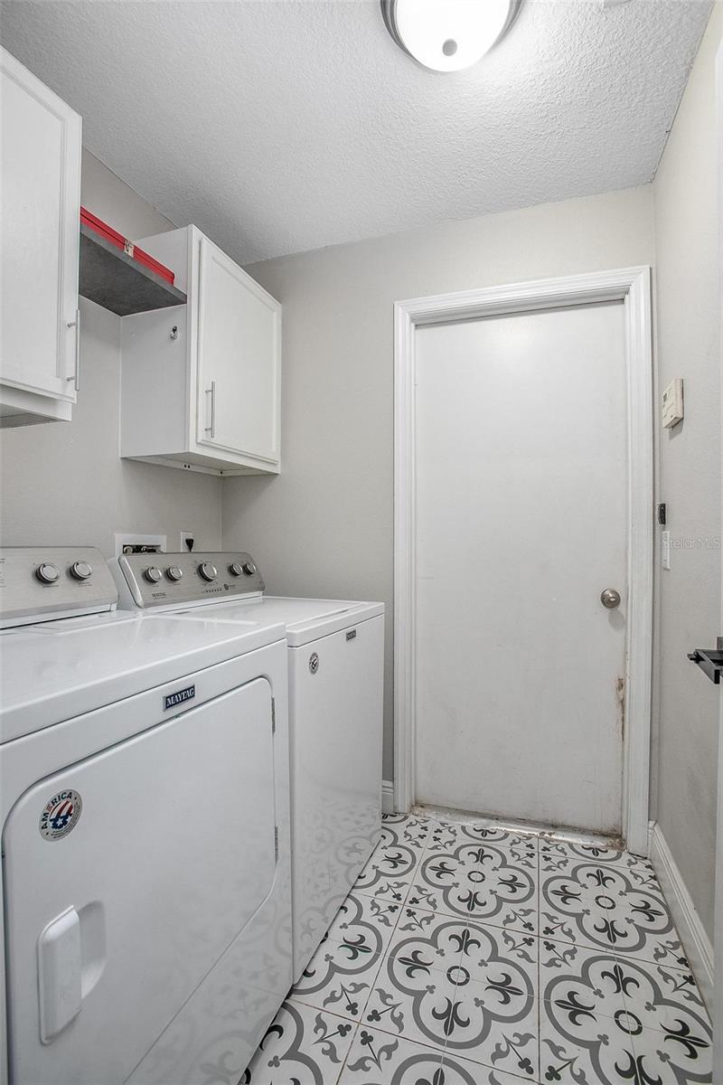 Indoor laundry, washer and dryer convey.
