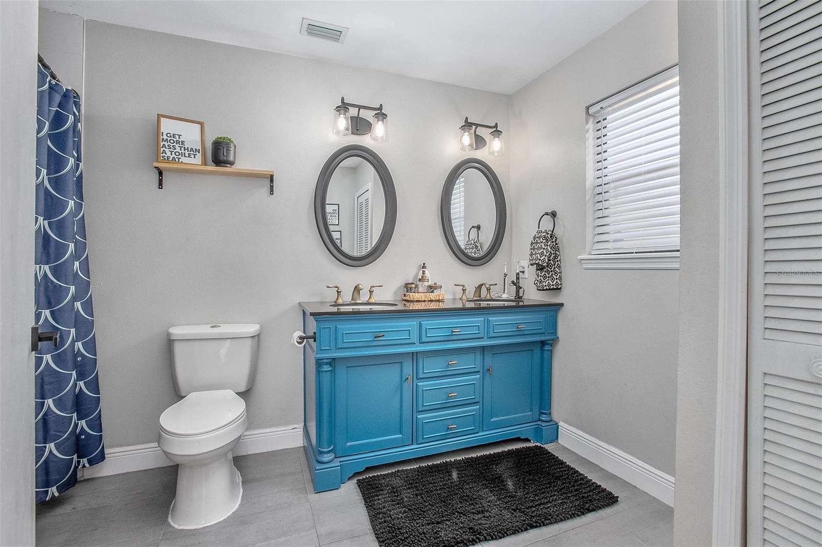 Owners suite private bath with dual vanity.