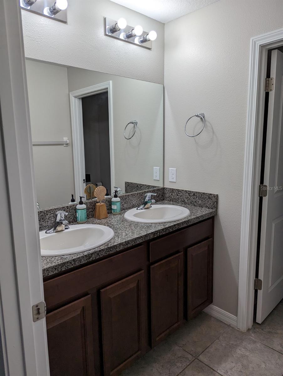 Dual sinks in the upstairs bathroom
