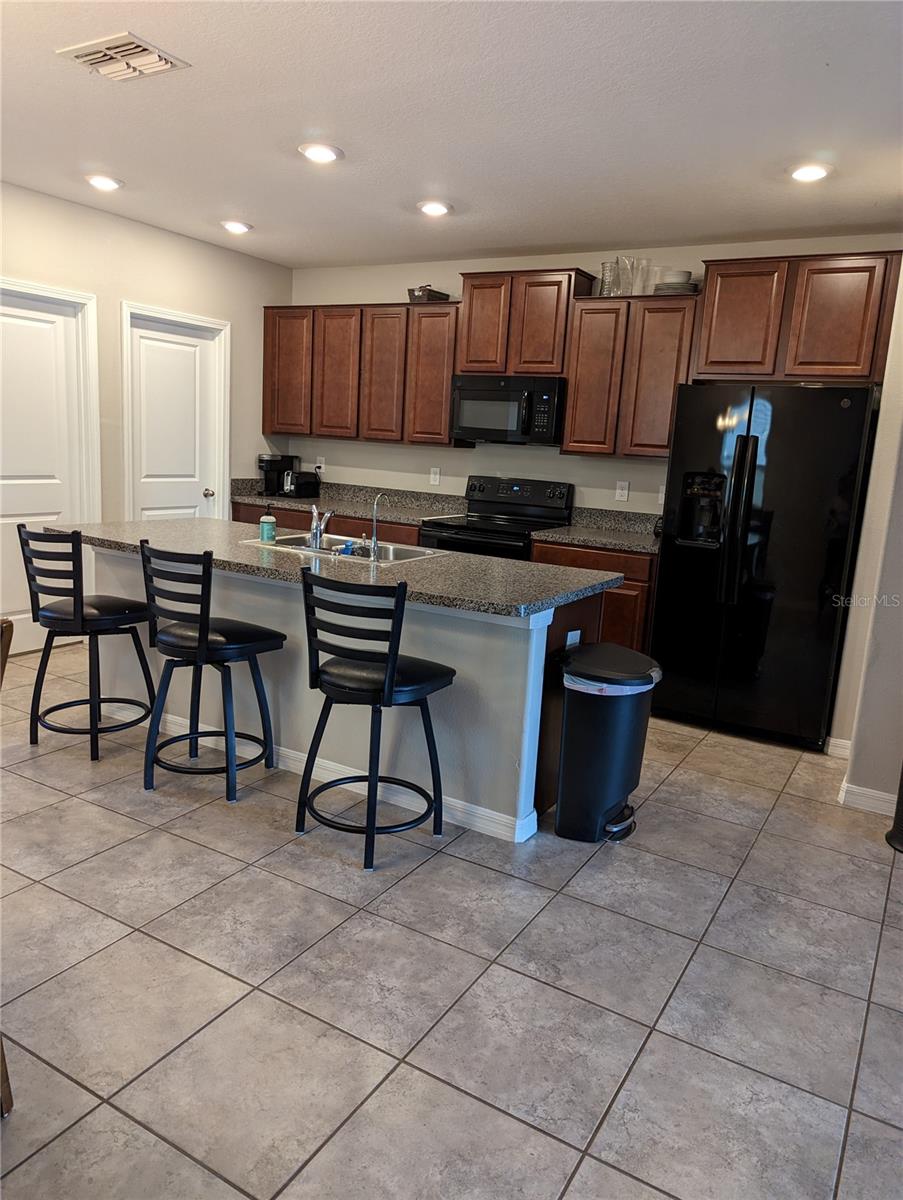 Kitchen with plenty of cabinets and a walk in pantry!