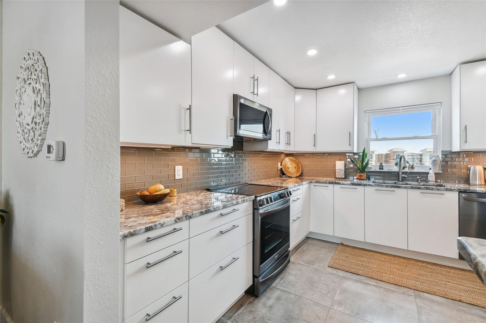 All new custom cabinets, granite counters and stainless appliances