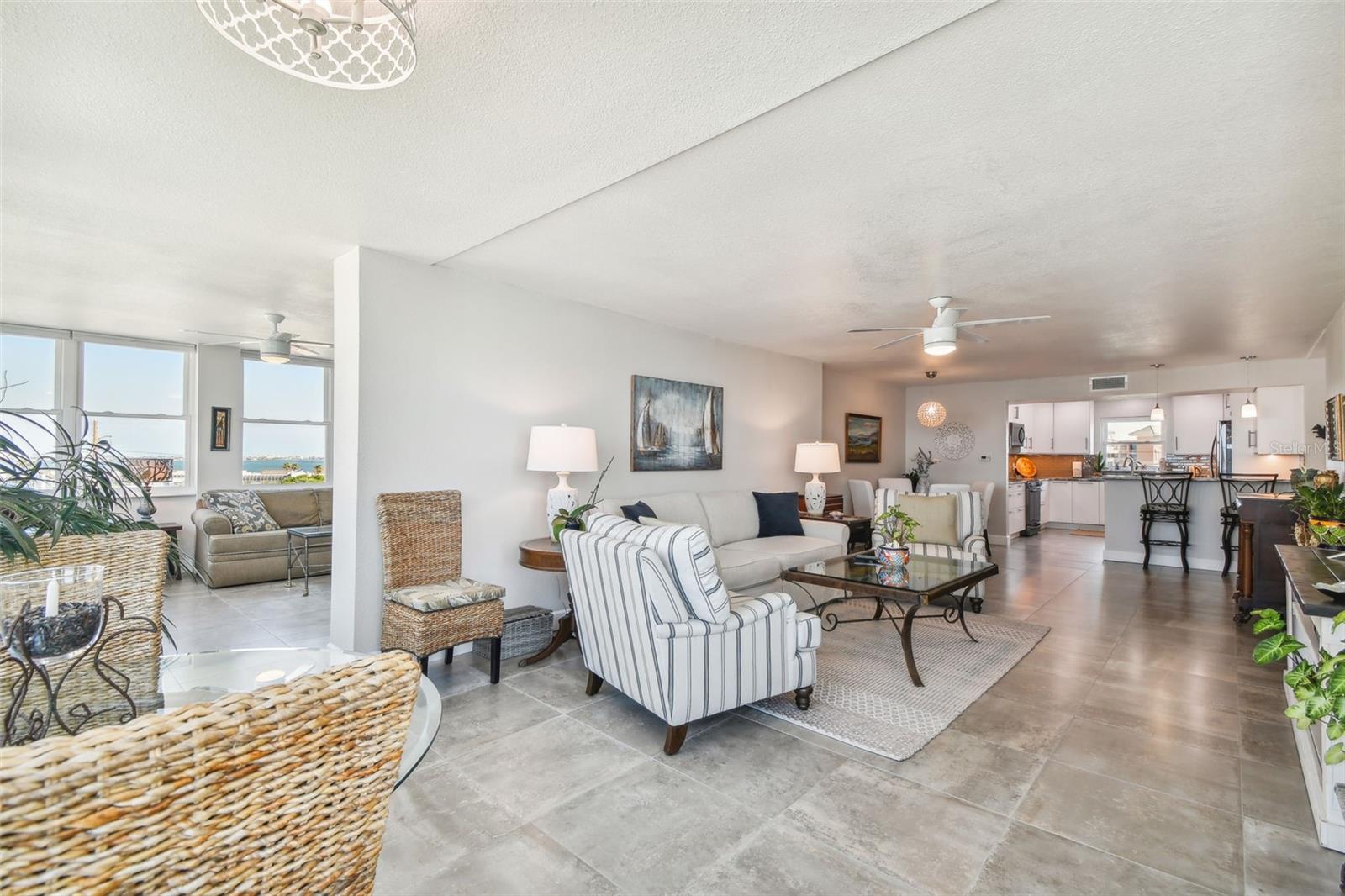 Huge open floor plan family room with brand new windows in entire condo
