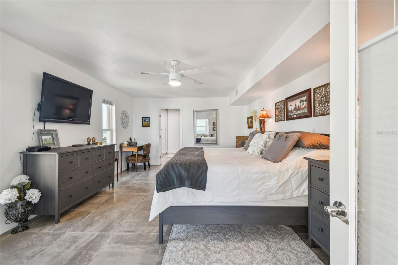 Master bedroom with adjacent sitting area