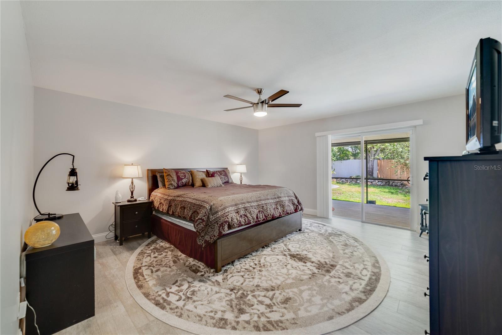 The primary bedroom is a tranquil retreat, offering a second direct access entry to the lanai, a walk-in closet and private en-suite bath also updated with the same finishes as the kitchen!
