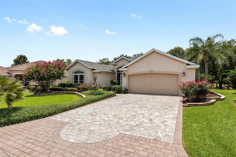 STRETCHED 3/2 "LANTANA" DESIGNER WITH SPECTACULAR GOLF COURSE AND WATER VIEW WITH OVERSIZED LANAI AND HEATED POOL AND SPA!