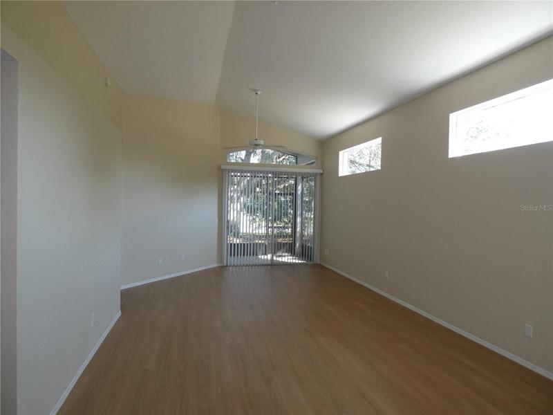 Living area with knock down ceiling texture