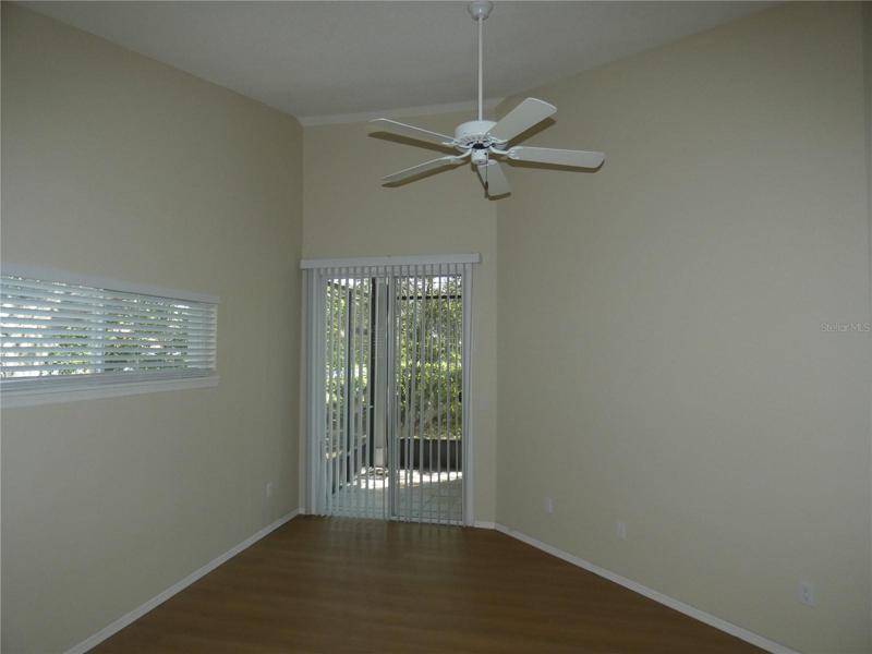 Master bedroom with slider to rear patio