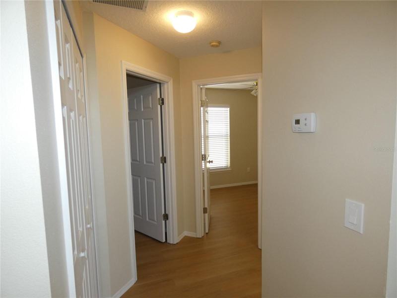 hall going into beds 2 and room and 2nd bath