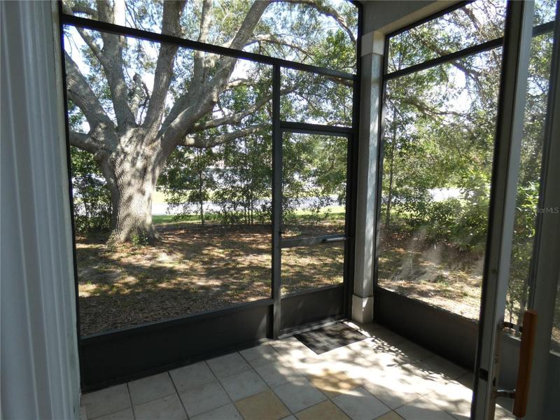 Rear covered and screened patio