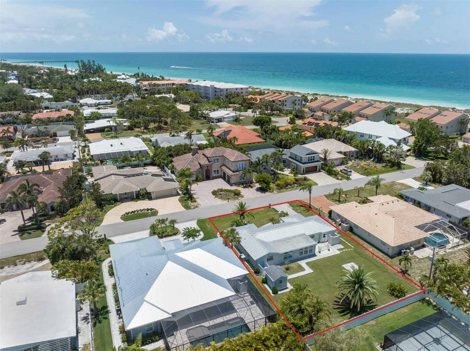Overhead drone shot looking Golden Beach and Gulf of Mexico
