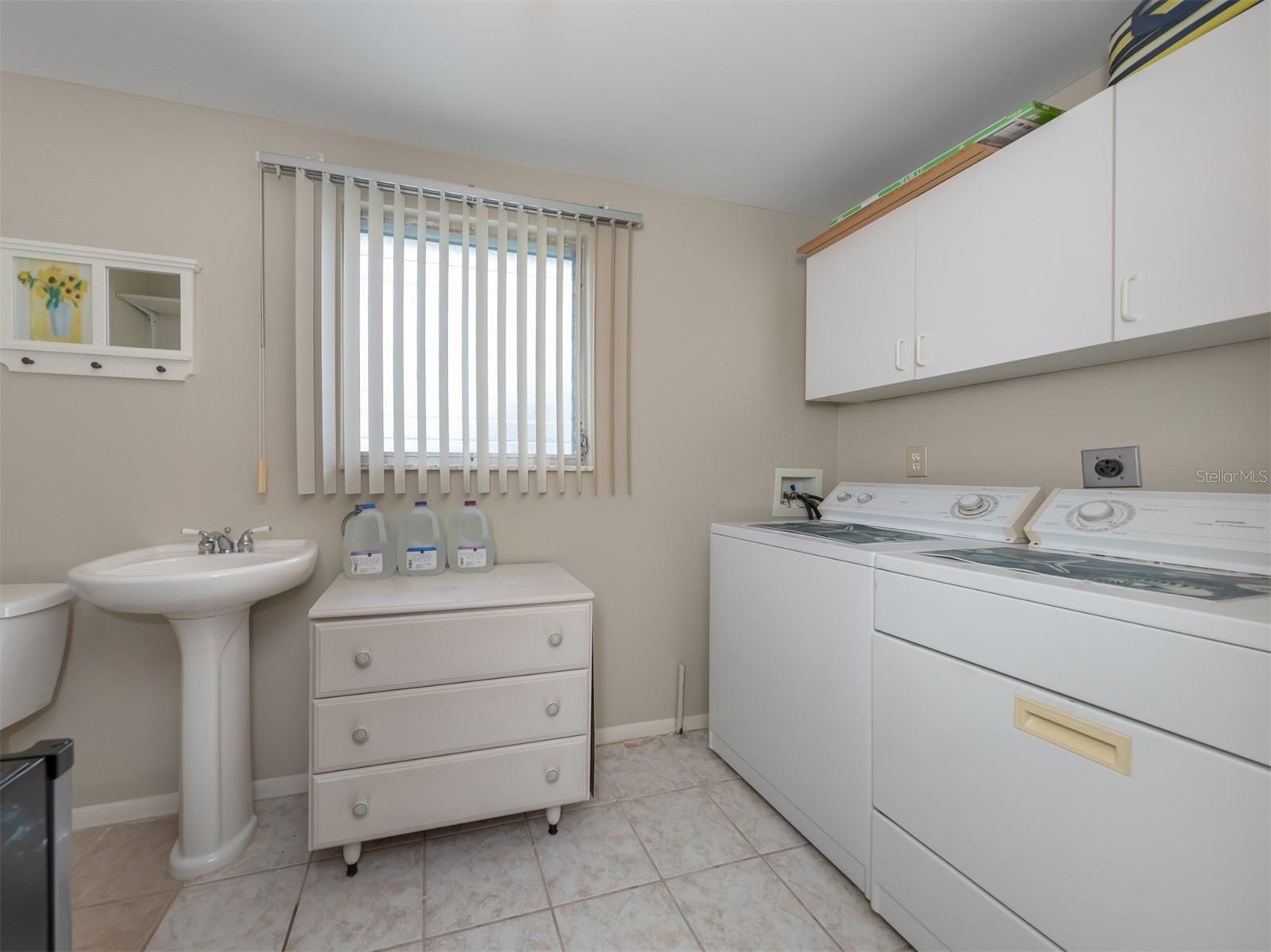Laundry room with half bath