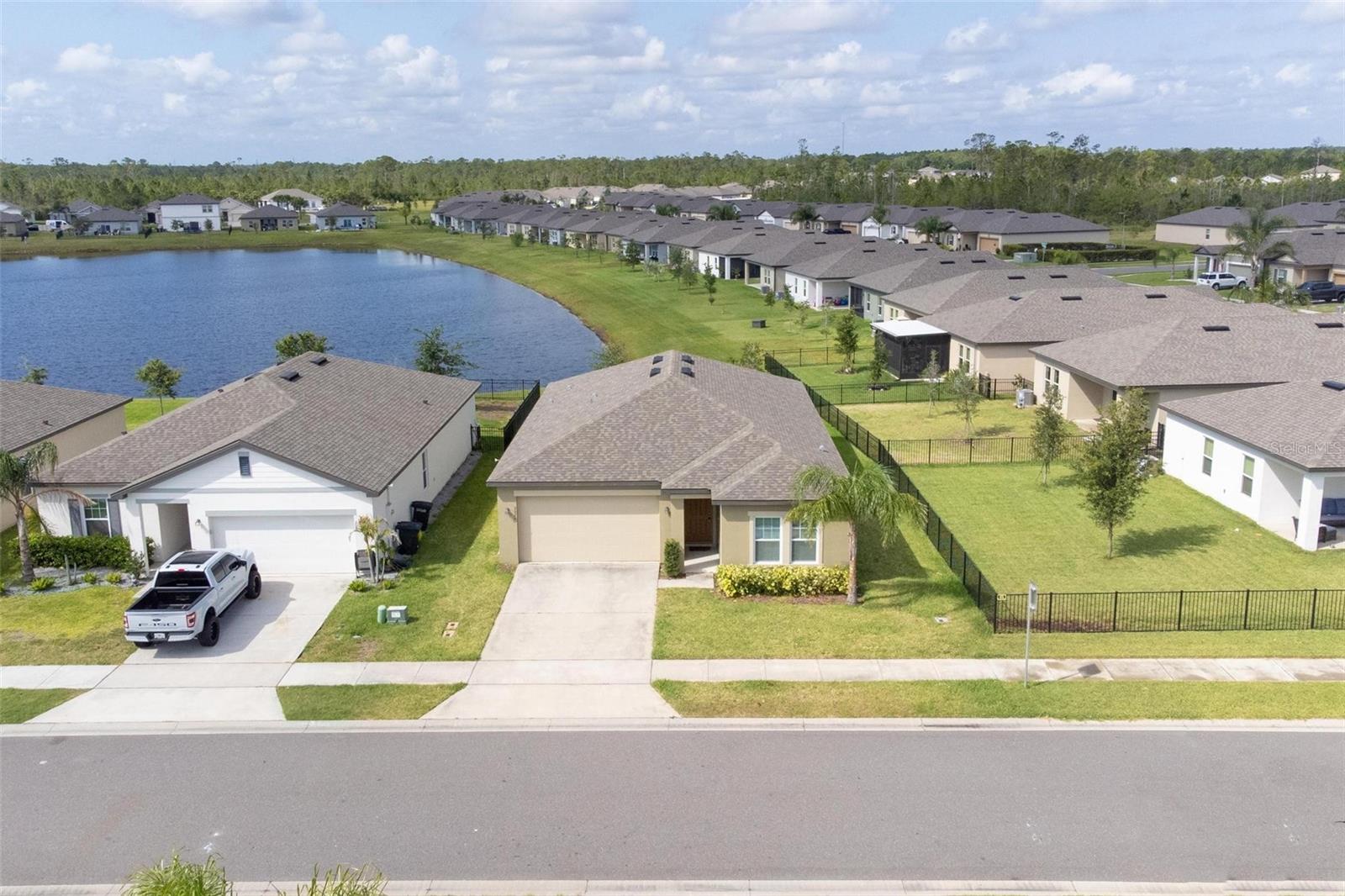 Aerial of home. New home, new roof (2019)