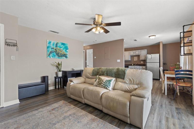 Living room leading to the waterfront balcony.