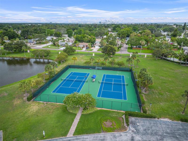 Tennis, pickle ball and basketball courts.