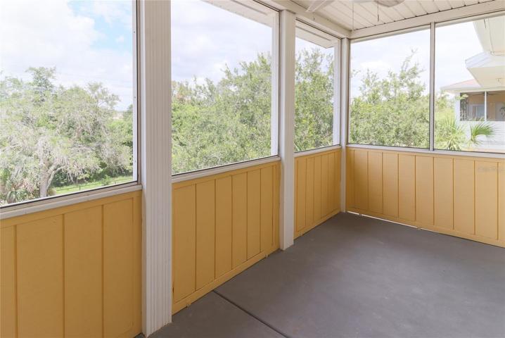 Private screened balcony overlooking the treetops