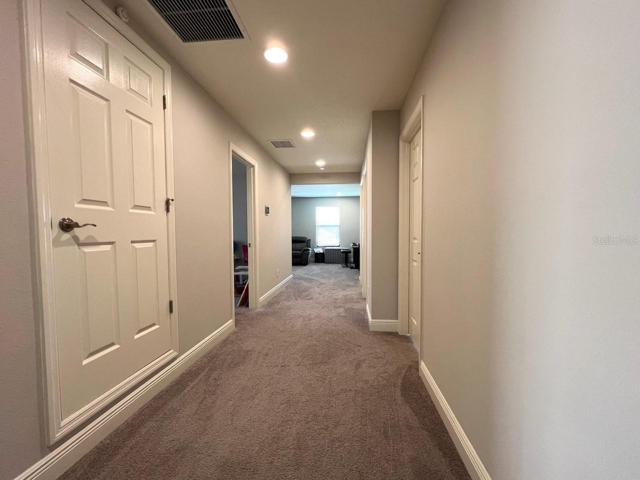 Hall to Loft and Bedrooms