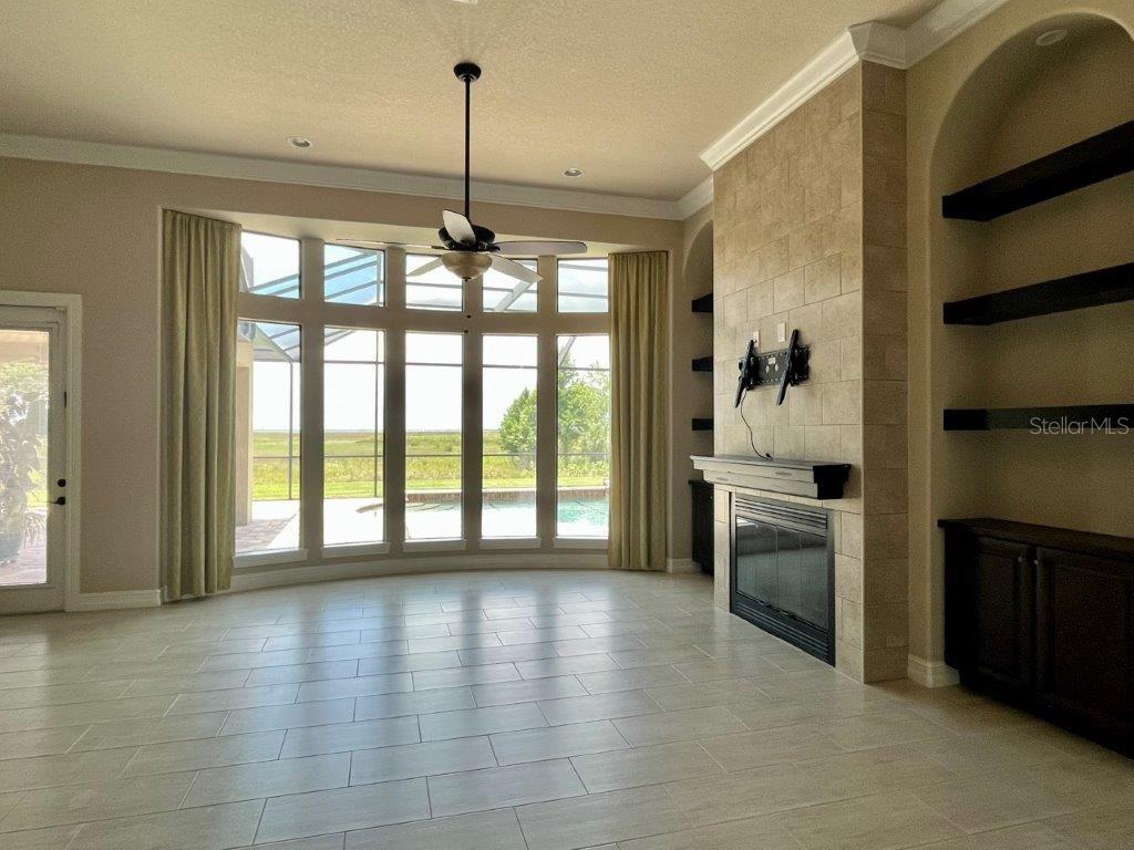 Bay Window View of Pool and Lake