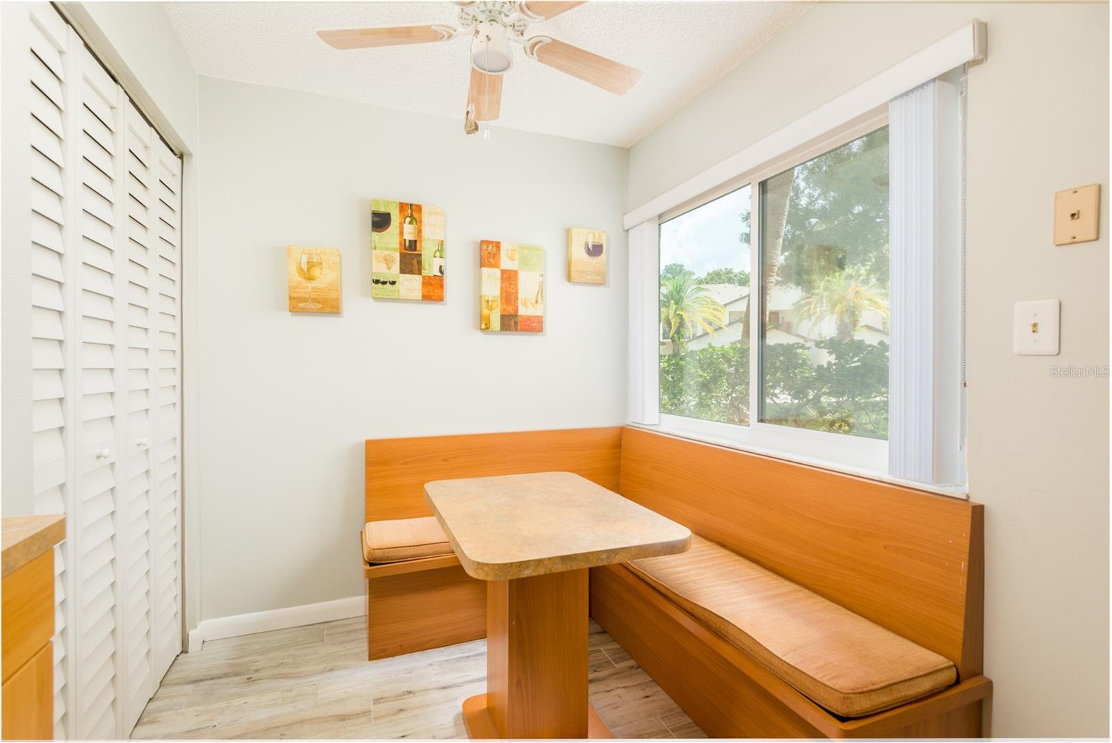 Custom built eat in space in kitchen if you decide to go with one big living room and not have a dining room.  New ceiling fan new closet doors.