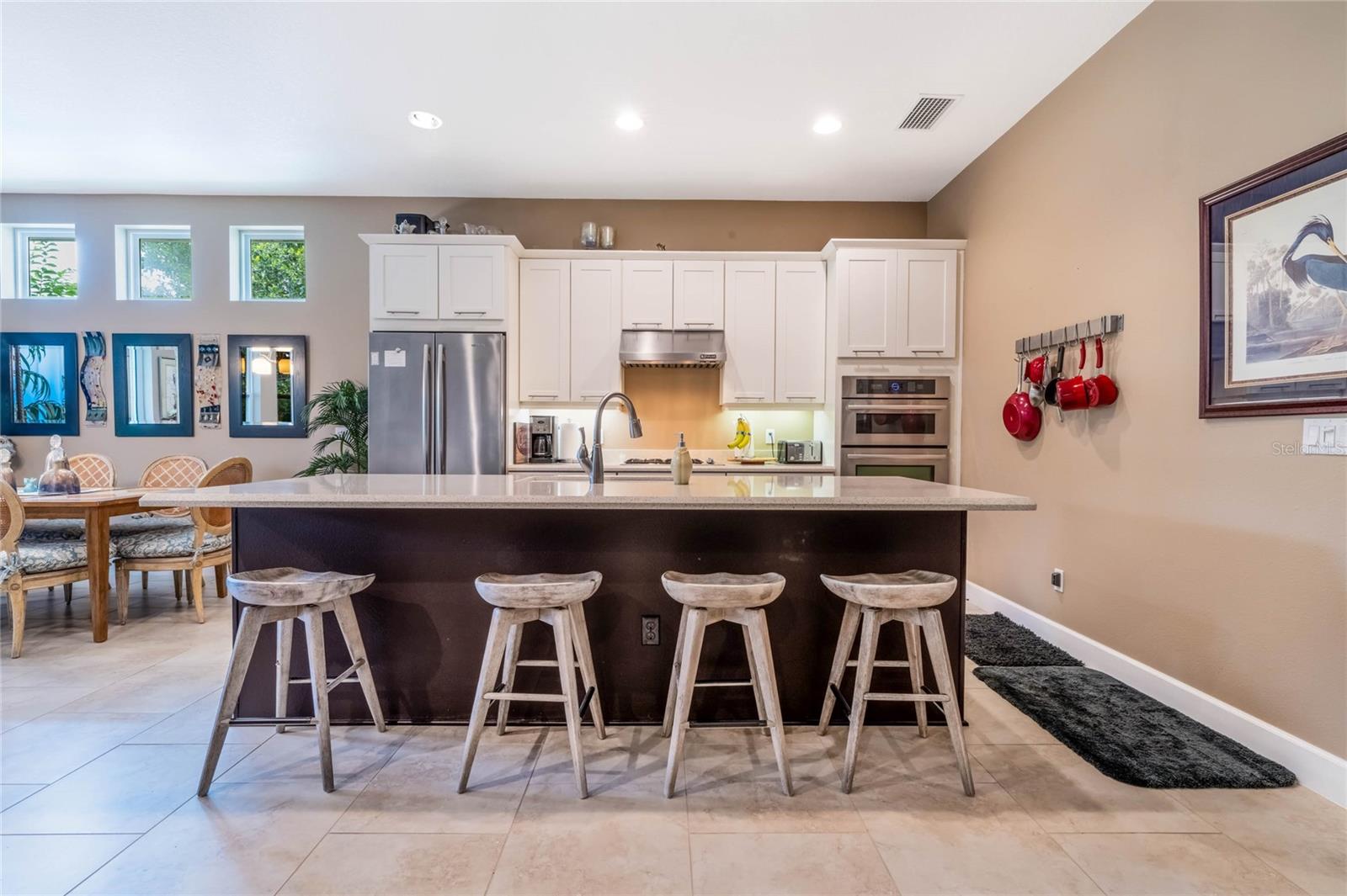 10' x 13'9" Kitchen w/ quartz counters, 42" "soft close" wood cabinets w/ crown & under cabinet lighting & stainless steel appliances