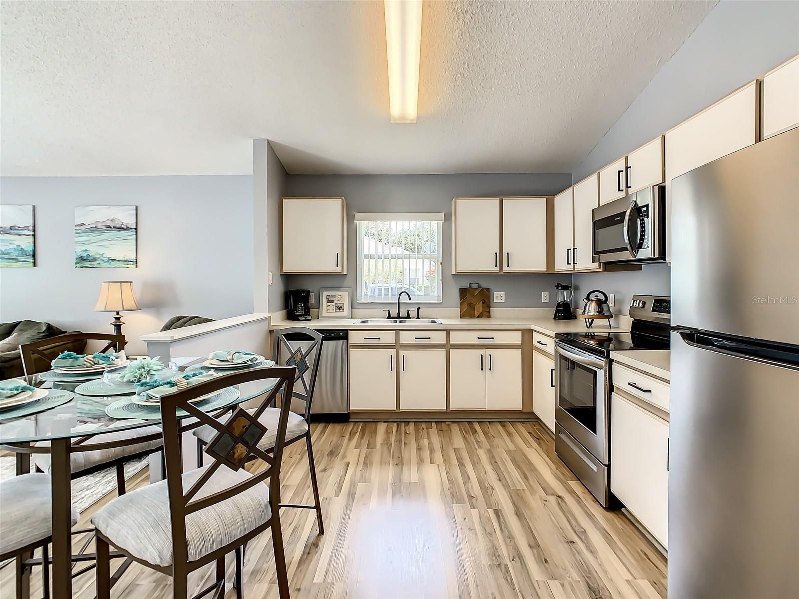 Spacious kitchen with bistro table and pantry