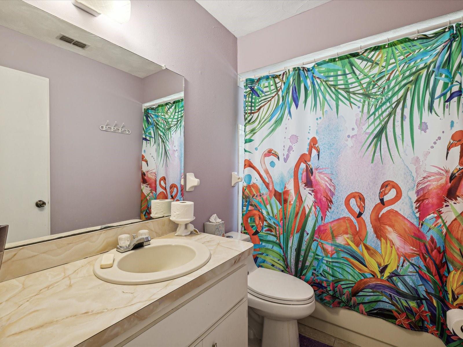 hallway bathroom with tub shower