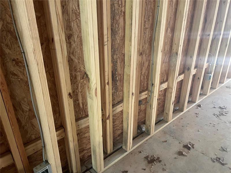 Double wall construction between adjacent units