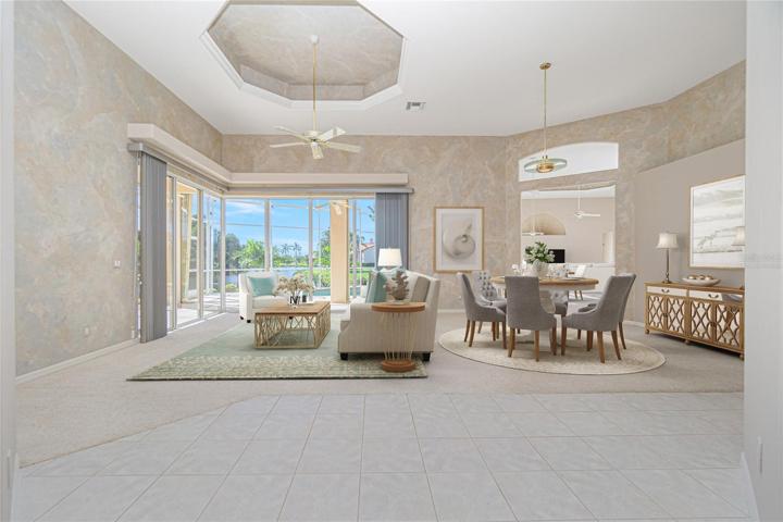 virtually staged great room / dining room