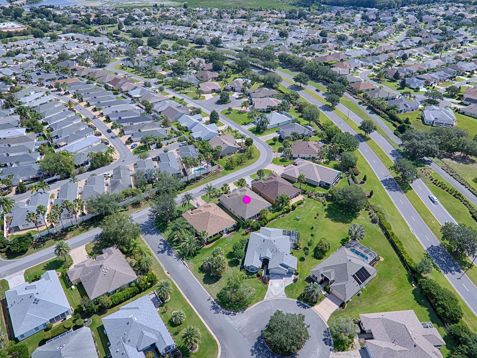 AERIAL VIEWS OF THE NEIGHBORHOOD.  VERY CLOSE TO LAKE SUMTER LANDING TOWN SQUARE.