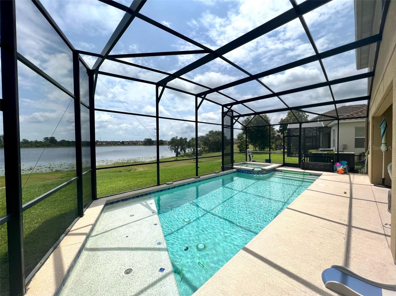 Pool has a Spa and huge Sunshelf!