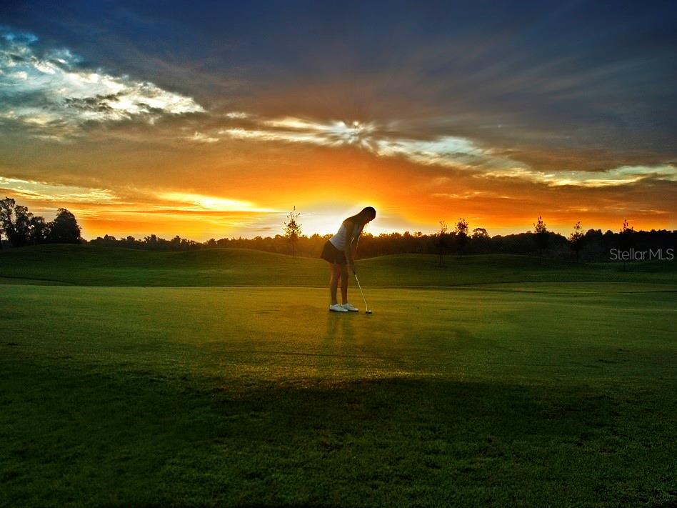Golf at sunset