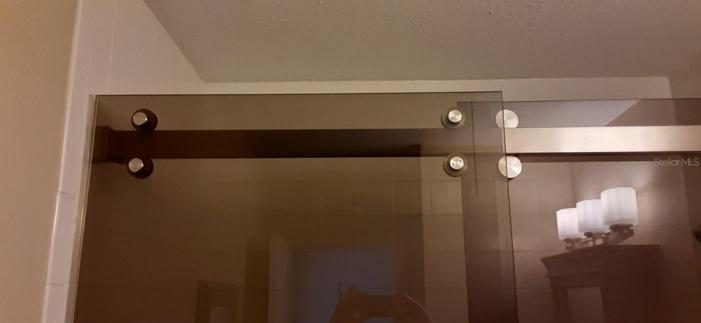 CUSTOM GLASS BARN SHOWER AND TUB DOORS