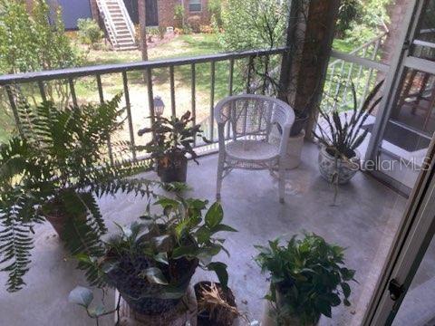 LOVELY BALCONY OVERLOOKING NICELY LANDSCAPED BACK