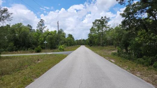Lot on right, road to the left is Persimmon Lane