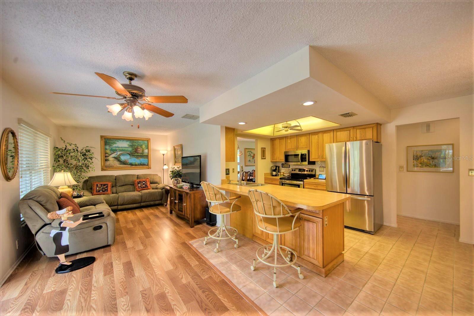 Family room right off the open kitchen and seating  area